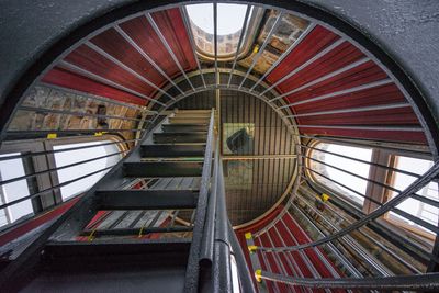 Low angle view of spiral staircase in building