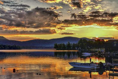 Scenic view of lake at sunset