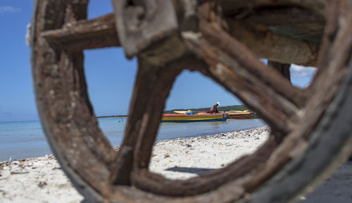 People on beach against sky