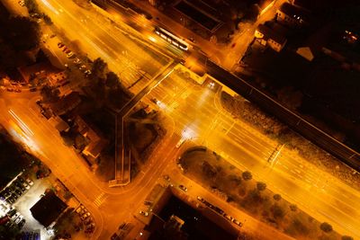 High angle view of illuminated city street at night