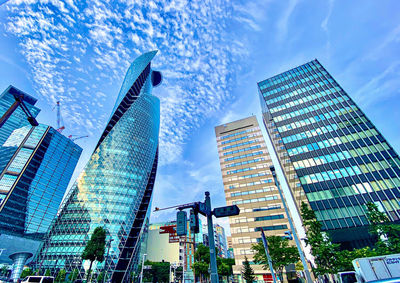 Low angle view of modern buildings against sky