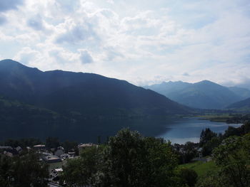 Scenic view of mountains and lake against sky