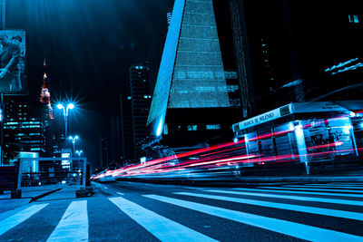 Light trails on city street at night