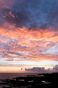 Scenic view of dramatic sky during sunset