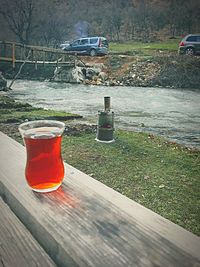 Glass of water on land