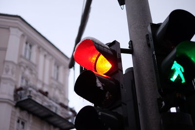 Low angle view of illuminated road signal