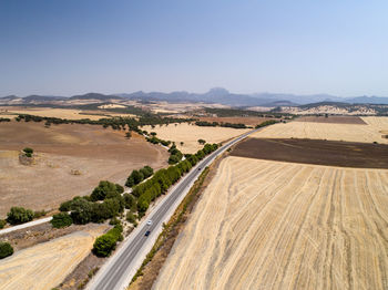 Scenic view of land against clear sky