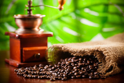 Close-up of coffee beans on table