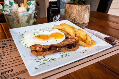 High angle view of breakfast served on table