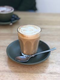 Cup of coffee on table