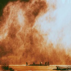 Panoramic view of boats against sky