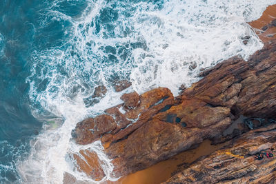 Waves splashing on rocks