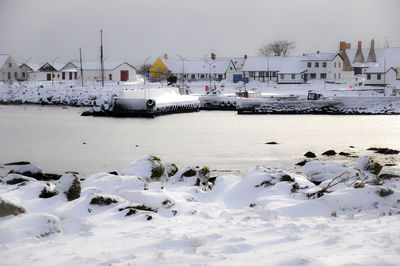 Scenic view of sea against sky during winter