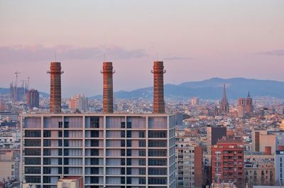 High angle view of cityscape against sky during sunset