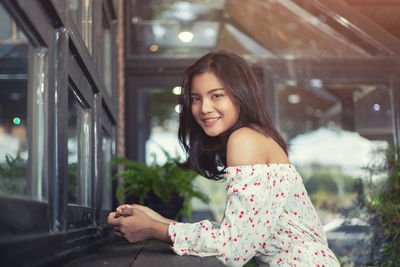 Portrait of a smiling young woman