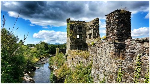 Castle against cloudy sky
