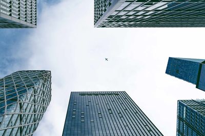 Low angle view of modern buildings against sky