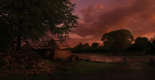 Scenic view of landscape against cloudy sky