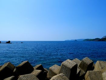 Scenic view of sea against clear sky