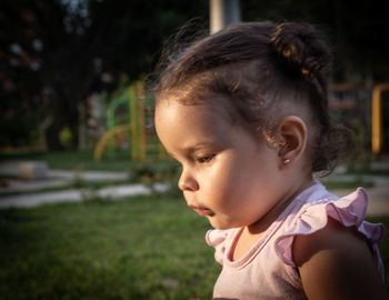 Portrait of cute girl looking away