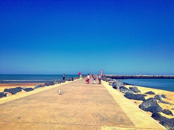 Scenic view of calm sea against clear sky