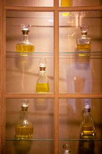 View of perfume bottles on shelf