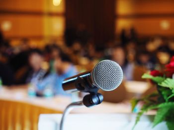 Close-up of microphone in auditorium