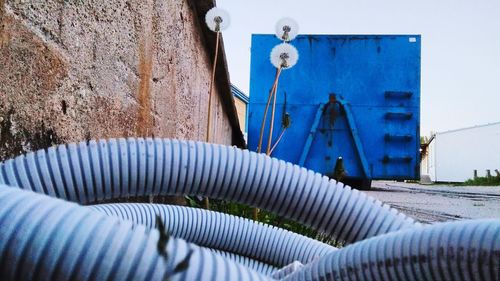 Close-up of blue pipe on wall