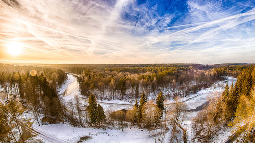 Scenic view of landscape against sky during sunset