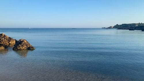 Scenic view of sea against clear sky