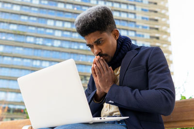 Young man using mobile phone