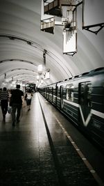 People on railroad station platform