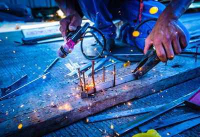 Man working on metal structure