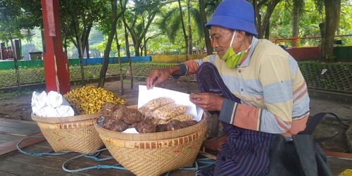 Man working in basket