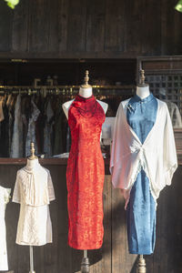 Rear view of woman standing in temple