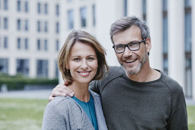 Portrait of happy mature couple outdoors