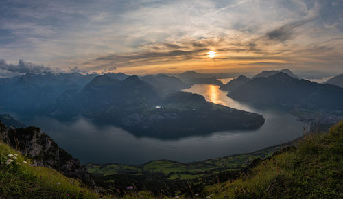 Scenic view of mountains against sky during sunset