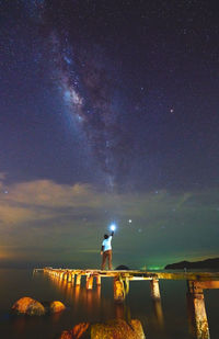 Scenic view of illuminated star field against sky at night