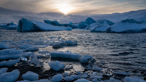 Sundown in the glacier lagoon of joekulsarlon, winter in iceland, europe