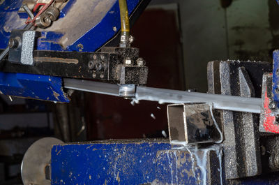 Process of cutting metal pipes. metalworking. metal dust.