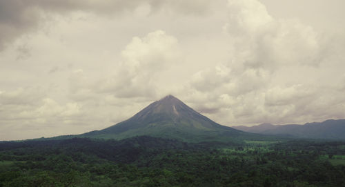 Scenic view of volcanic landscape against sky