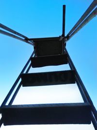 Low angle view of built structure against blue sky