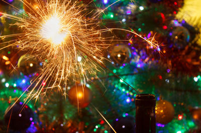 Close-up of illuminated christmas tree at night