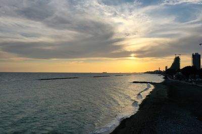 Scenic view of sea against sky during sunset