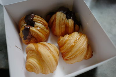 High angle view of garlic in plate on table