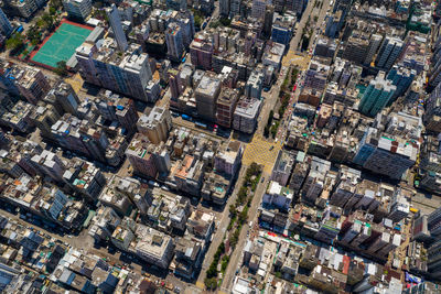 Aerial view of street amidst buildings in town