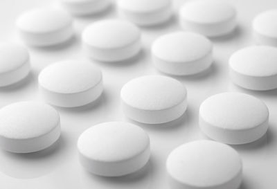 Close-up of medicines on white background