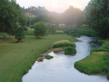 Scenic view of river against sky