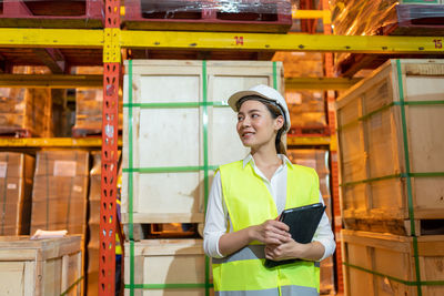 Full length portrait of woman working