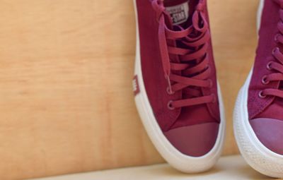 Low section of shoes on table